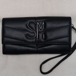 Steve Madden clutch almost new